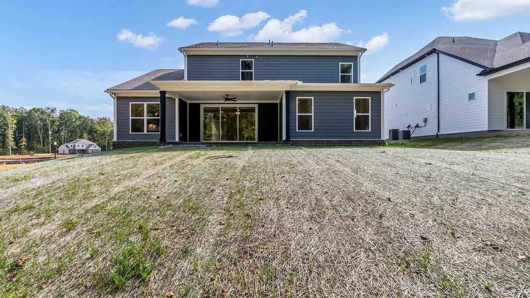 Exterior details and patio area of a home in Brush Creek, Fairview (Image 26).