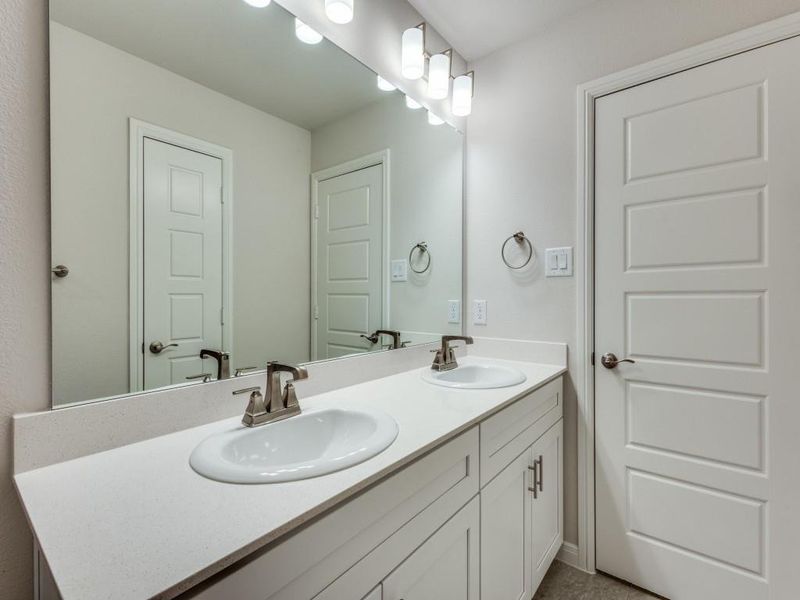 Guest will enjoy their own vanity space in this thoughtfully designed guest bath. Guest will enjoy their own vanity space in this thoughtfully designed guest bath.