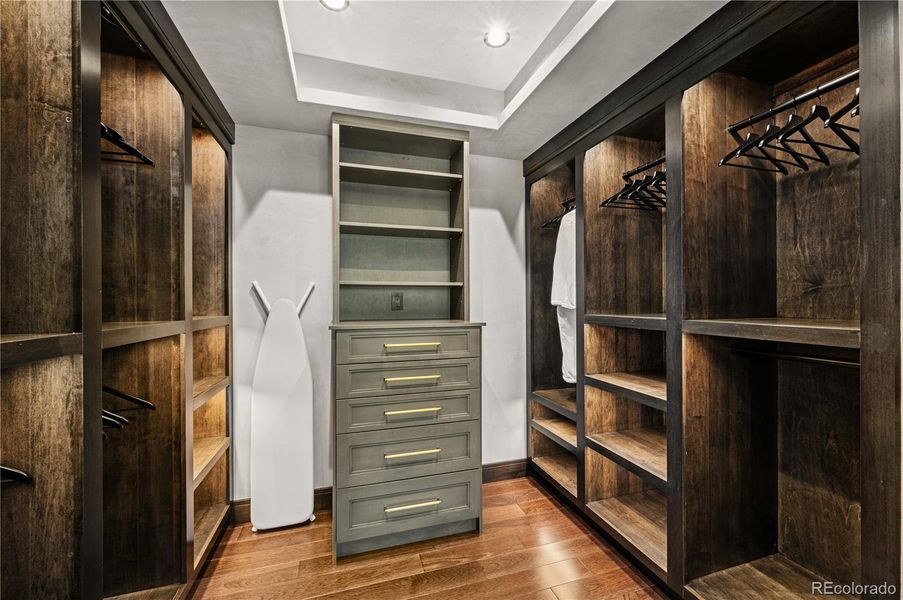 Primary custom walk-in closet with shoe and close storage Primary custom walk-in closet with shoe and close storage