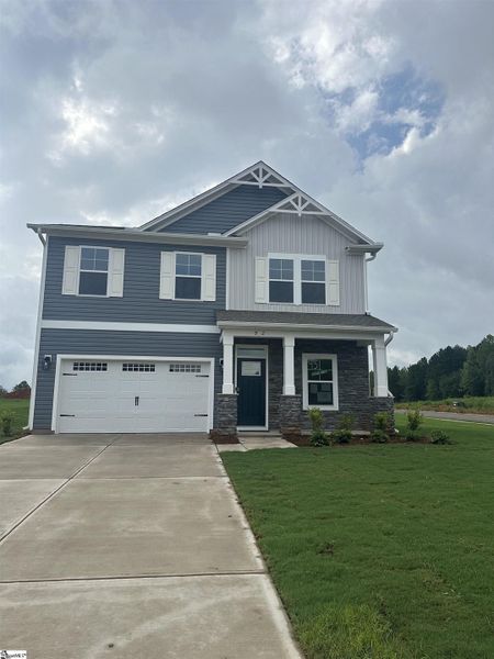 Front exterior of a new home in Shiloh Trail, Wellford, SC, highlighting curb appeal (Image 2). Front exterior of a new home in Shiloh Trail, Wellford, SC, highlighting curb appeal (Image 2).