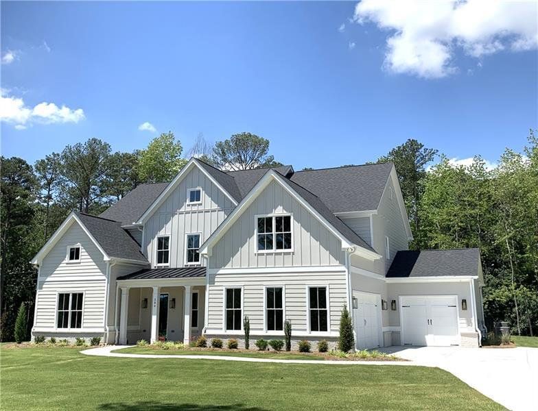 Front exterior of a new home in , Marietta, GA, highlighting curb appeal (Image 25).