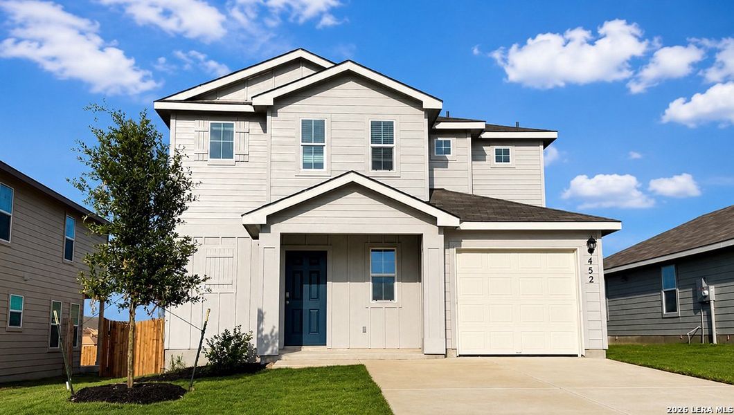 Front exterior of a new home in Redbird Ranch, San Antonio, TX, highlighting curb appeal (Image 2).