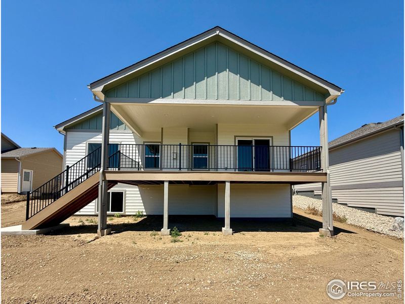 Front exterior of a new home in , Wellington, CO, highlighting curb appeal (Image 15). Front exterior of a new home in , Wellington, CO, highlighting curb appeal (Image 15).
