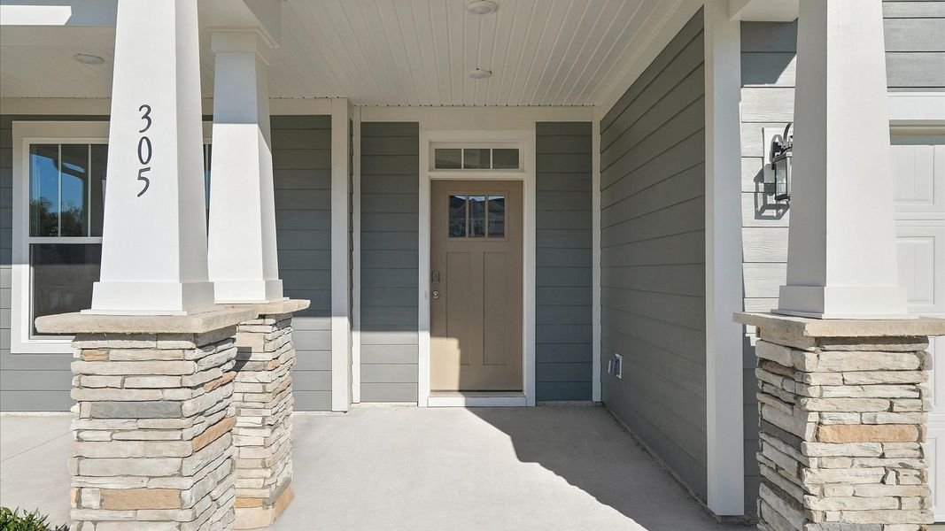 Elegant finishes and modern features in this proven DRB Homes design near vibrant downtown life