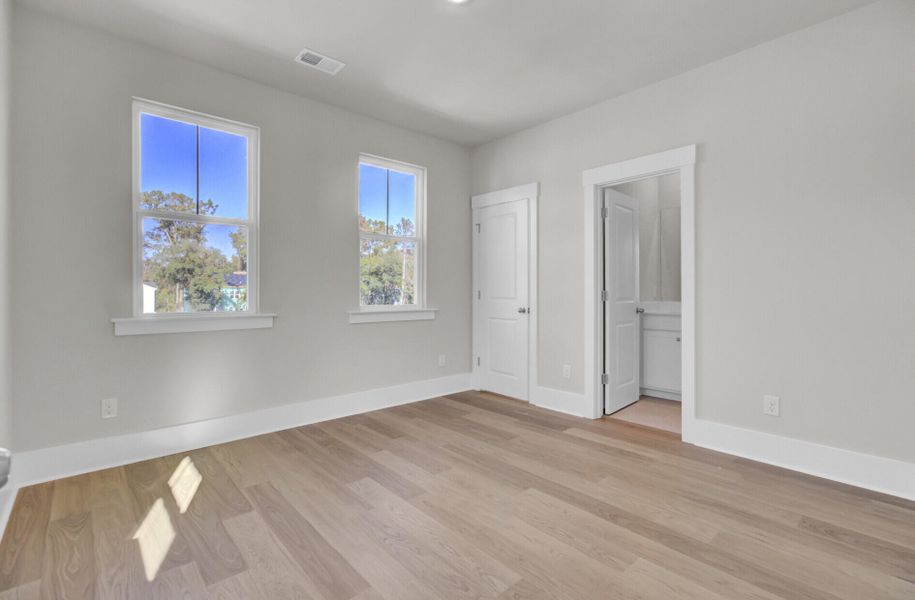 Spacious, unfurnished interior of a new home in Indigo Grove Single Family Homes, Johns Island (Image 21).
