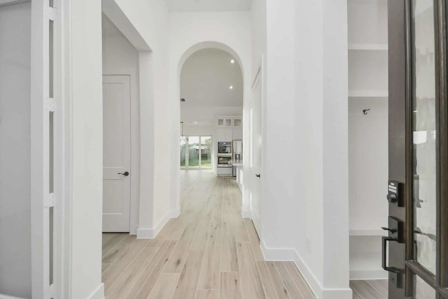 Representative unfurnished interior of a home built from the Bonneville by Chesmar Homes in Meridiana 50's and 60's, Manvel (Image 18).