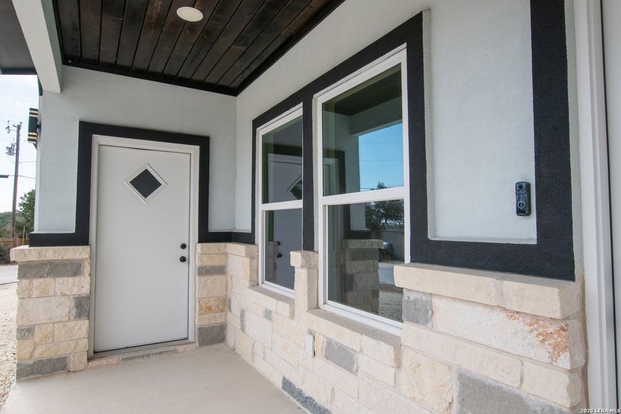 Exterior details and patio area of a home in , Spring Branch (Image 2). Exterior details and patio area of a home in , Spring Branch (Image 2).