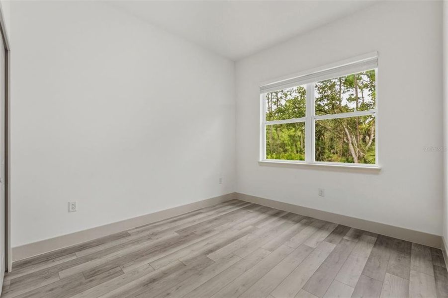 Spacious, unfurnished interior of a new home in , Port Charlotte (Image 12).