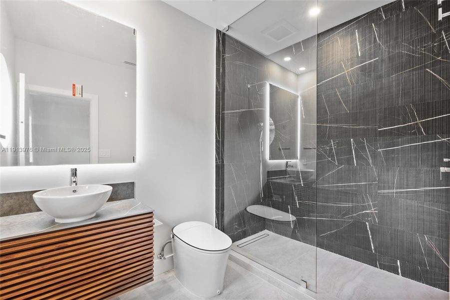 Furnished interior view inside a new home in , Miami Beach (Image 13). Furnished interior view inside a new home in , Miami Beach (Image 13).