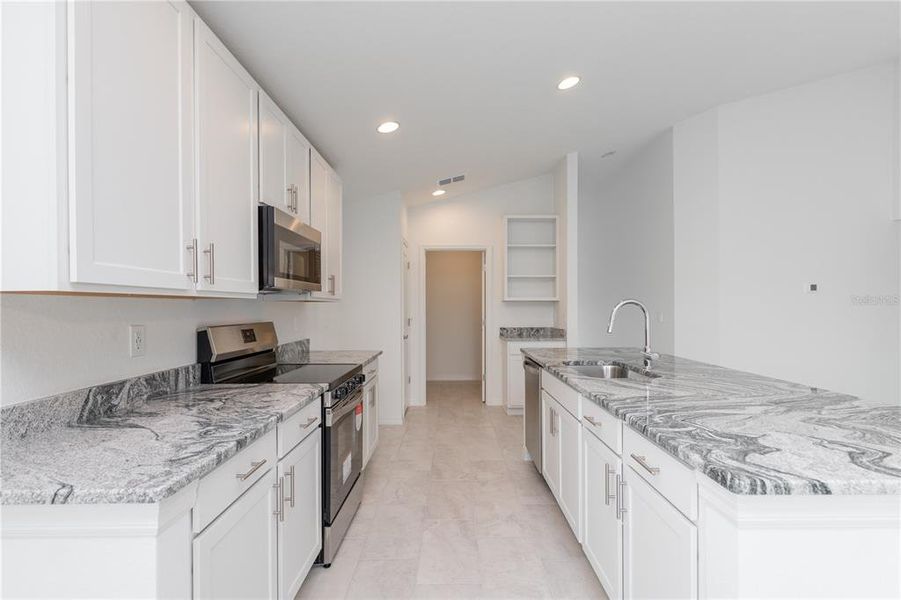 Furnished interior view inside a new home in , Winter Haven (Image 10).