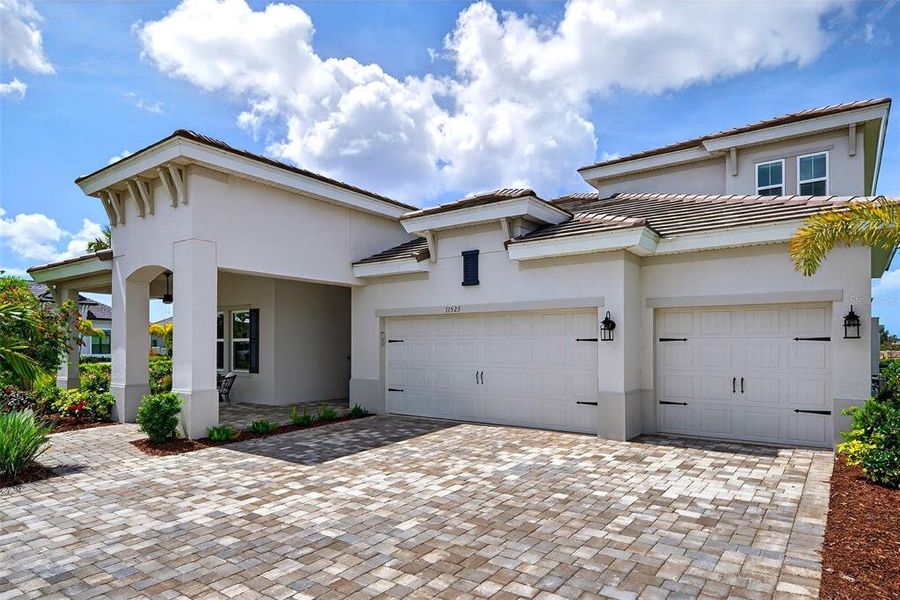 Front exterior of a new home in , Venice, FL, highlighting curb appeal (Image 21).