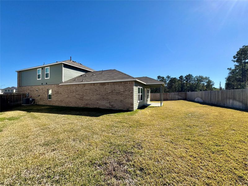 Spacious, well-maintained lawn offers endless possibilities, with ample space for a pool and additional outdoor features. Spacious, well-maintained lawn offers endless possibilities, with ample space for a pool and additional outdoor features.