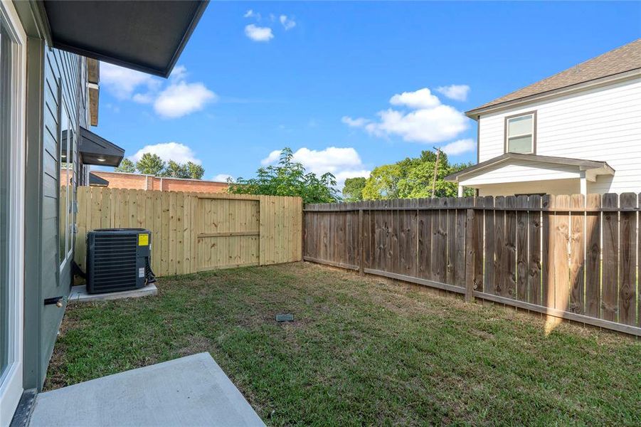 Enjoy a private backyard retreat, ideal for relaxation and outdoor gatherings. This tranquil space offers privacy and a serene atmosphere, perfect for enjoying the outdoors in peace.