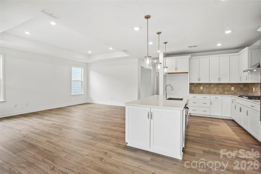 Perfect layout for entertaining. Kitchen is open to gathering room with tray ceiling... Perfect layout for entertaining. Kitchen is open to gathering room with tray ceiling...