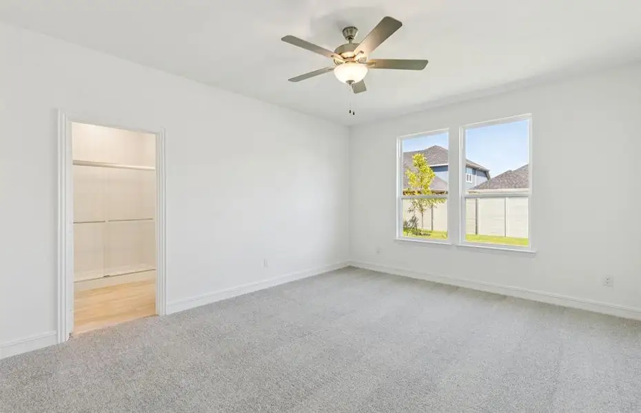 Oversized owner's suite showcases with ample closet space