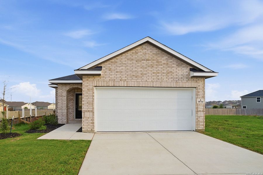 Front exterior of a new home in Willow View, Converse, TX, highlighting curb appeal (Image 12). Front exterior of a new home in Willow View, Converse, TX, highlighting curb appeal (Image 12).