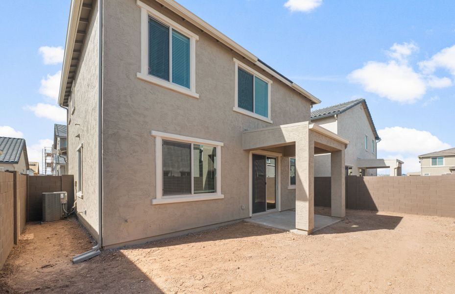 Exterior details and patio area of a home in Asante- Atrium Series, Surprise (Image 3).