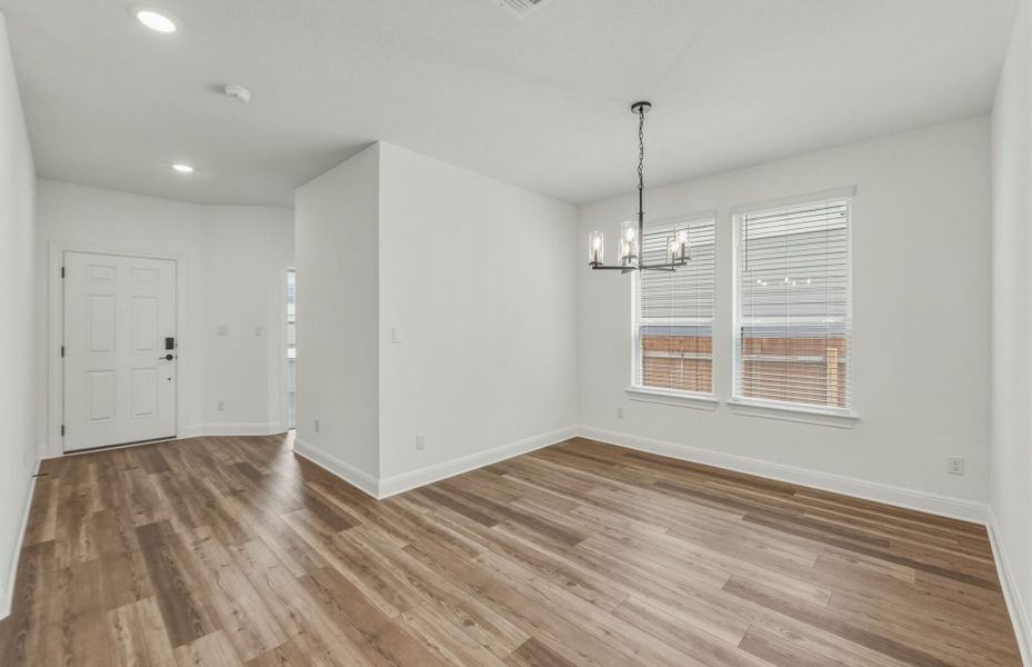 Representative unfurnished interior of a home built from the Woodland by Pulte Homes in Santa Rita Ranch, Liberty Hill (Image 13).