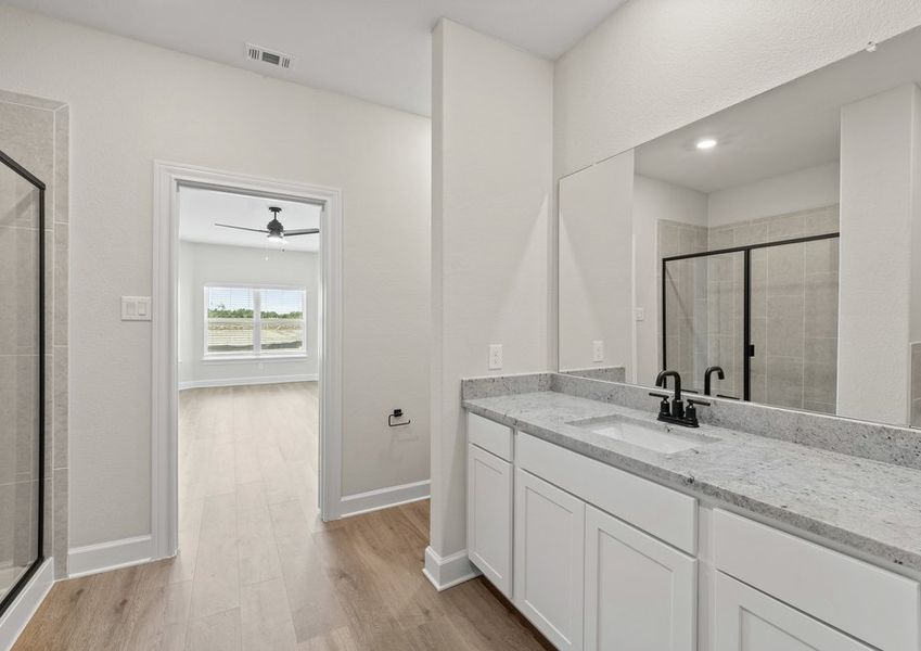 The master bathroom of the Cypress has a large vanity space.