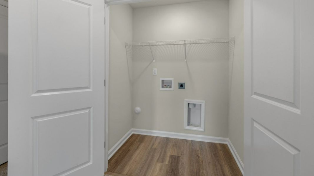 Representative furnished interior of a home built from the PEARSON TOWNHOME by D.R. Horton in Grayson Park Townhomes, Leland (Image 19).