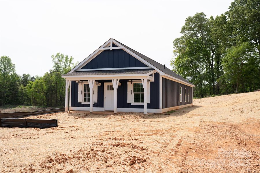 Front exterior of a new home in , Clover, SC, highlighting curb appeal (Image 16).
