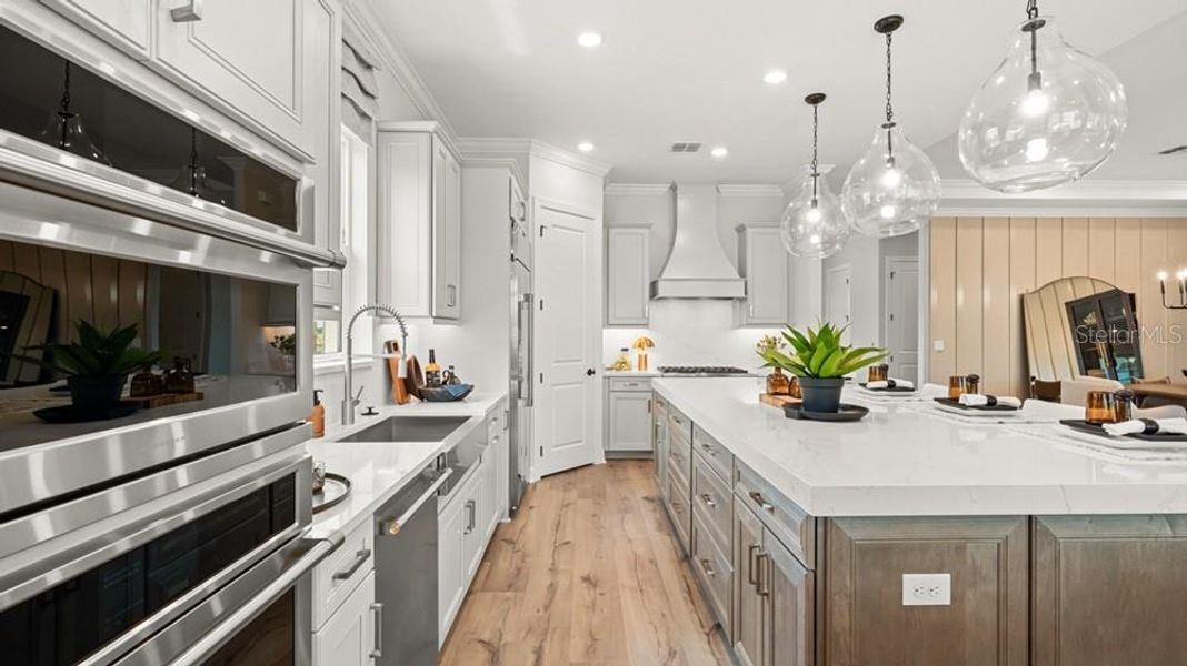 Furnished interior view inside a new home in Esplanade at Wellen Park, Englewood (Image 12).