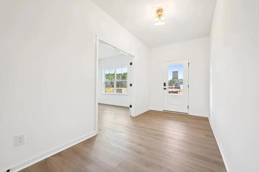 Foyer featuring AW Collection® Oxford - Natural light and bold details create an inviting first impression. Foyer featuring AW Collection® Oxford - Natural light and bold details create an inviting first impression.