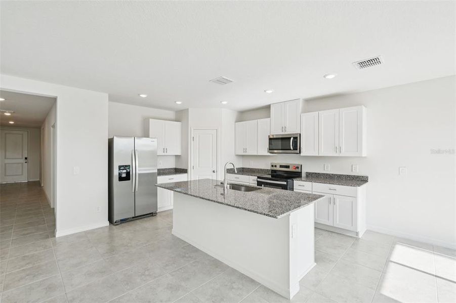 Furnished interior view inside a new home in Crosswinds - Signature Series, Haines City (Image 5).