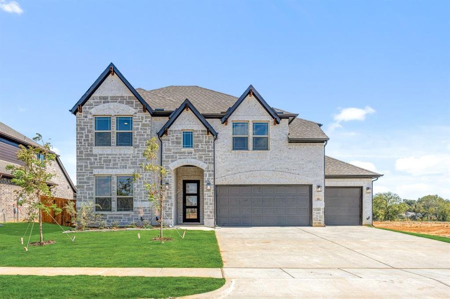 Front exterior of a new home in Mockingbird Hills 60-65, Joshua, TX, highlighting curb appeal (Image 16).