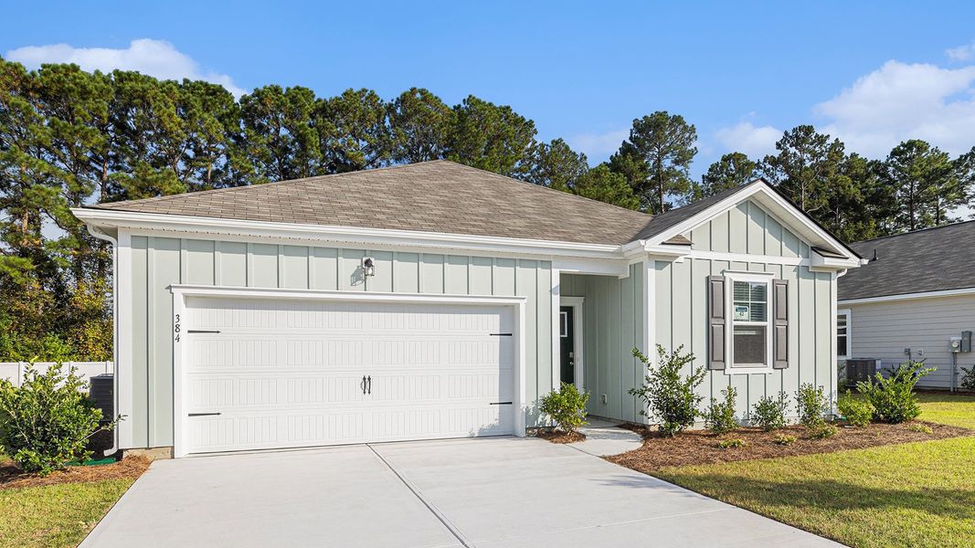 Front exterior of a new home in Ravenloft, Conway, SC, highlighting curb appeal (Image 19). Front exterior of a new home in Ravenloft, Conway, SC, highlighting curb appeal (Image 19).