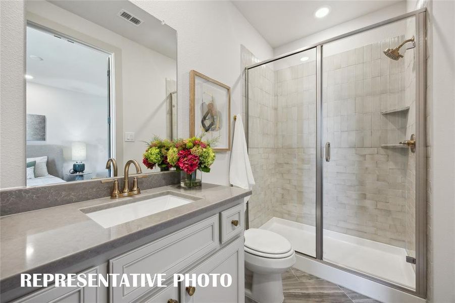 Your guests will never want to leave the beautiful and spacious guest baths in our Sophie plan!  REPRESENTATIVE PHOTO