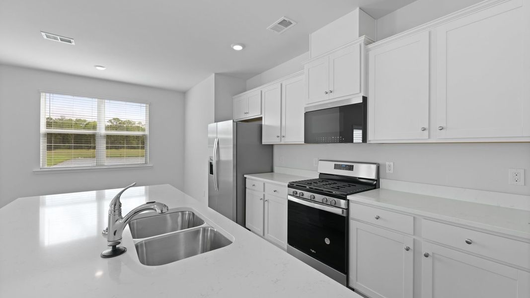 Representative furnished interior of a home built from the SALEM by D.R. Horton in Carolina Groves, Moncks Corner (Image 8).