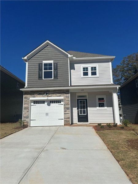 Exterior details and patio area of a home in Brownstone Park, Easley (Image 2).