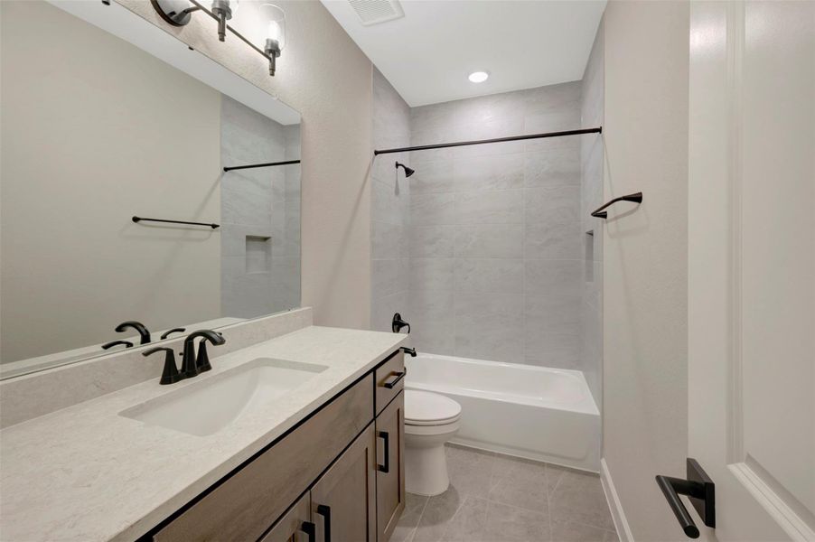 Furnished interior view inside a new home in The Woodlands Hills 70’, Willis (Image 15).