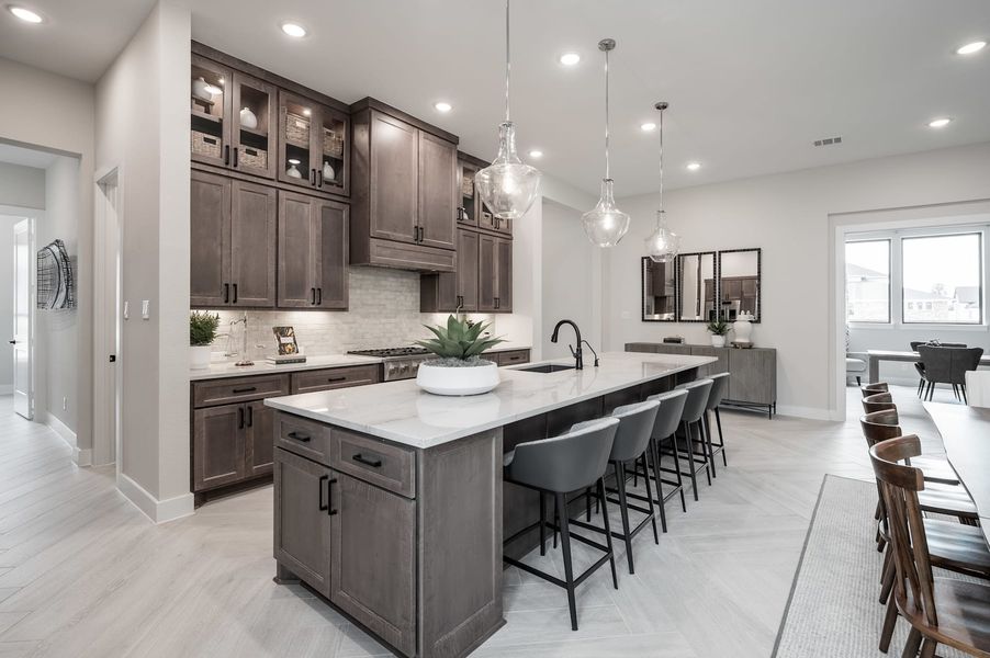 Representative furnished interior of a home built from the Carignan by Tri Pointe Homes in Woodson’s Reserve, Spring (Image 41).