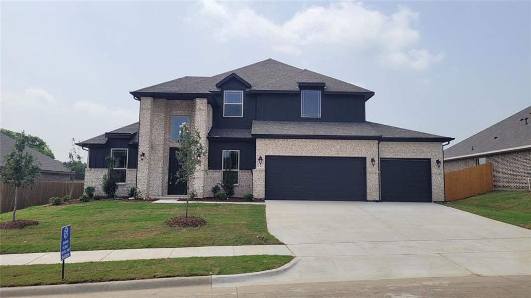 Front exterior of a new home in Cole Crossing Estates, DeSoto, TX, highlighting curb appeal (Image 16).
