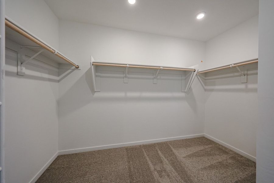A white room with a metal railing. A white room with a metal railing.