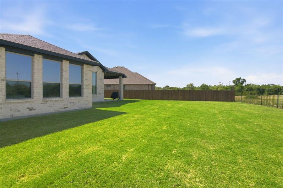 Exterior details and patio area of a home in , Burleson (Image 23).