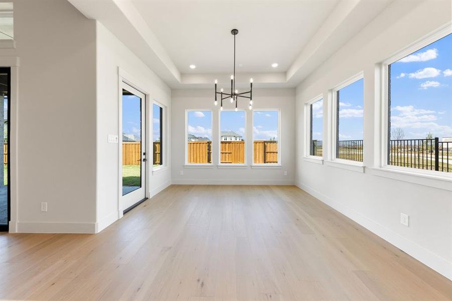Light filled and spacious, this dining area is the perfect place for lively dinner parties or cozy family gatherings.
