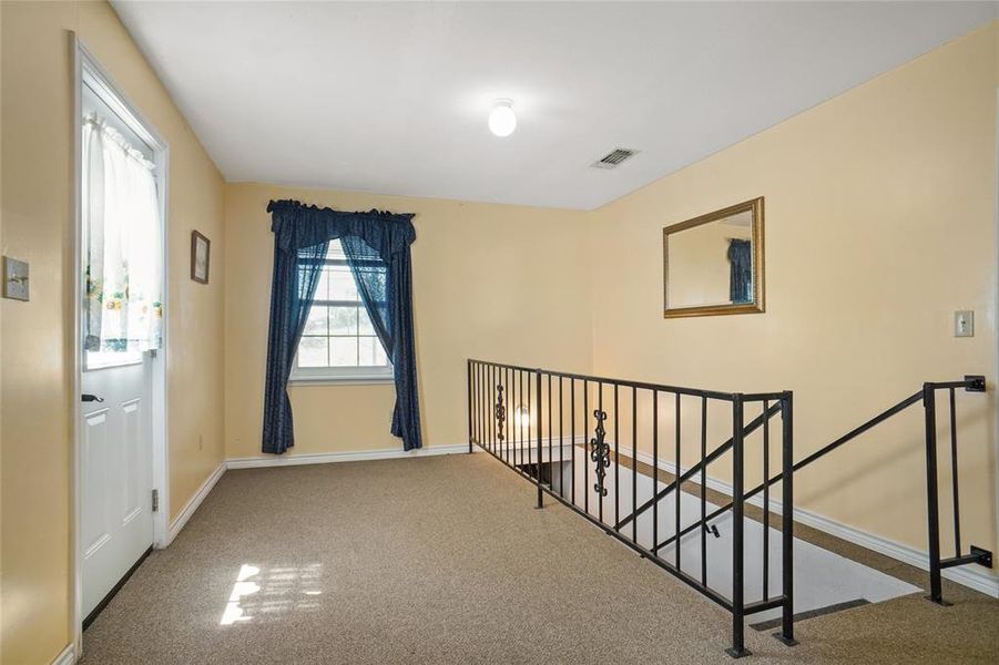 Entry way to Living Quarters and Stairs to Basement