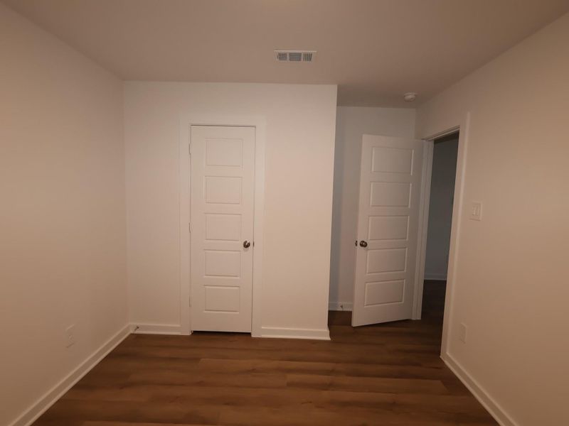 Spacious, unfurnished interior of a new home in Pinewood at Grand Texas, New Caney (Image 23).