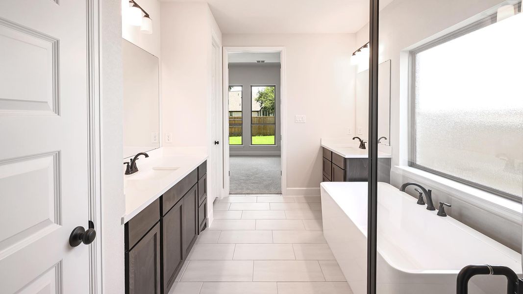 Furnished interior view inside a new home in 6 Creeks, Kyle (Image 12).