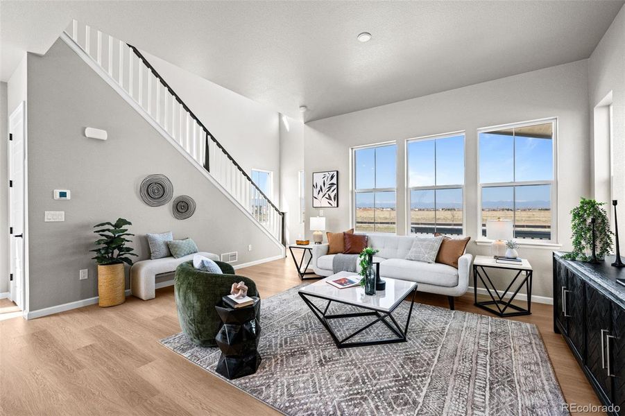 Furnished interior view inside a new home in Painted Prairie, Aurora (Image 7).