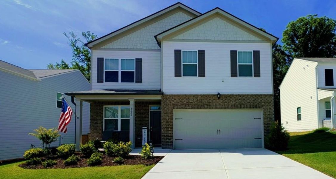 Front exterior of a new home in , Fairburn, GA, highlighting curb appeal (Image 2). Front exterior of a new home in , Fairburn, GA, highlighting curb appeal (Image 2).