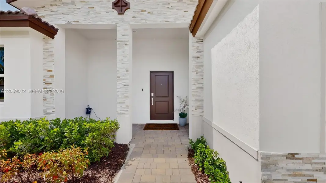 Exterior details and patio area of a home in , Homestead (Image 32). Exterior details and patio area of a home in , Homestead (Image 32).