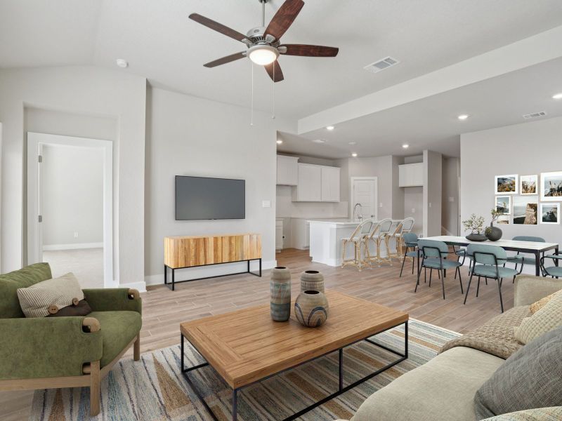 Kitchen, Living & Dining in the San Jacinto floorplan at a Meritage Homes community. Kitchen, Living & Dining in the San Jacinto floorplan at a Meritage Homes community.