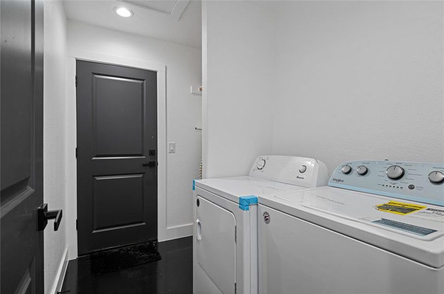 Washroom with washing machine and dryer