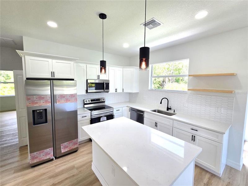 Furnished interior view inside a new home in , Port Charlotte (Image 6).