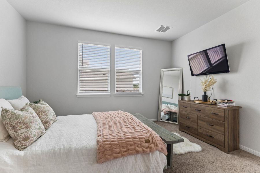 Furnished interior view inside a new home in Stallion Run, Buda (Image 13).
