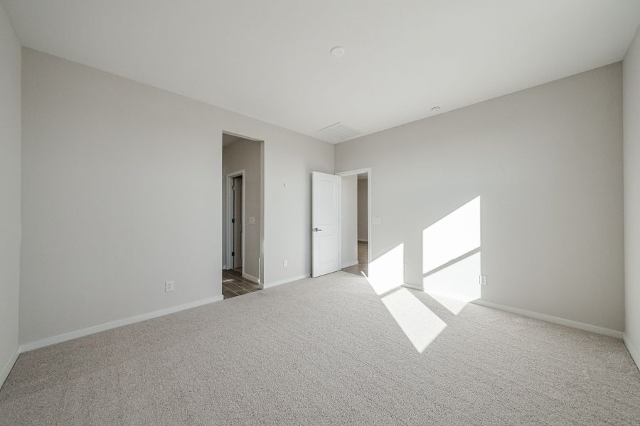 A long hallway with white walls. A long hallway with white walls.